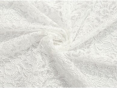 Кружевная ткань белого цвета вышитая с мелкими блестками