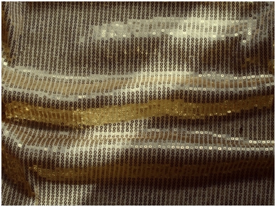 Блестящая ткань с блестками цвета желтого золота диаметром 0.2 см на трикотажной основе