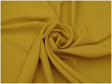 Tekstilinis audinys geltonos spalvos, įspaustu raštu