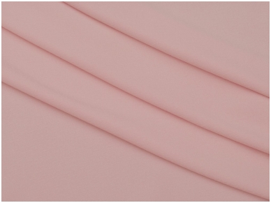 Текстильная ткань светло-розового цвета с тисненым рисунком